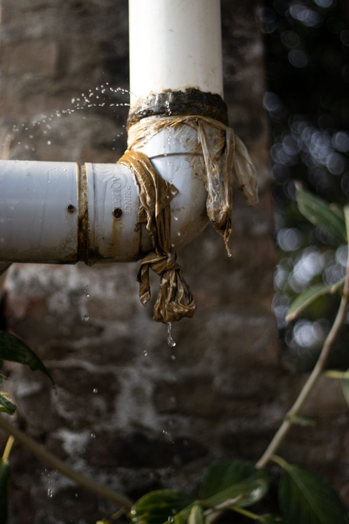 Leaking pipe with a temporary wrap repair