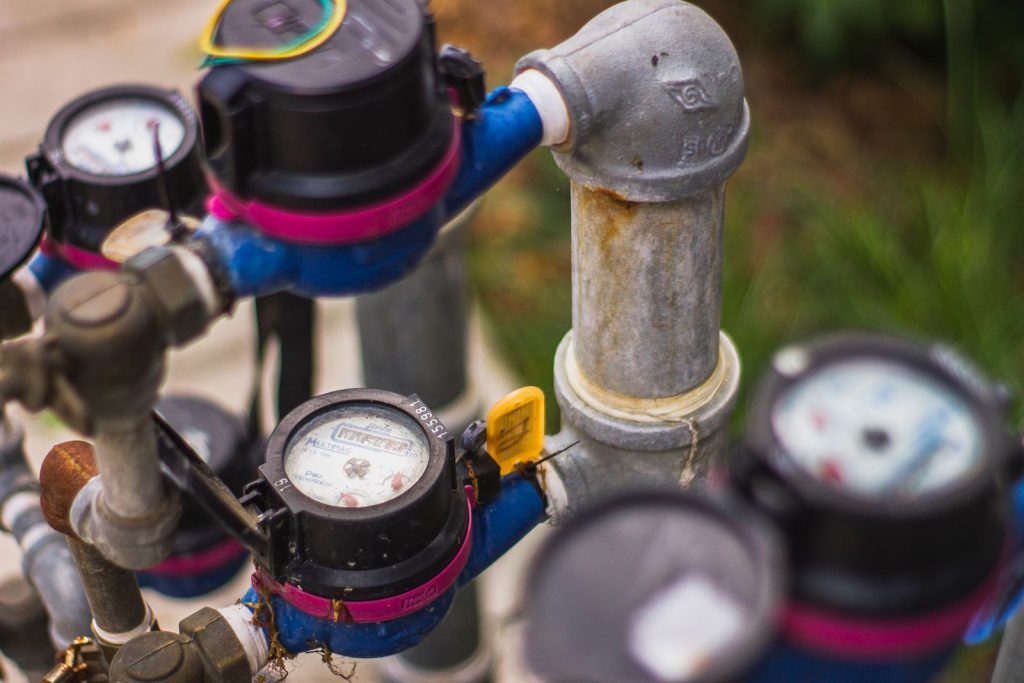 Water meters and supply valves on a building connection